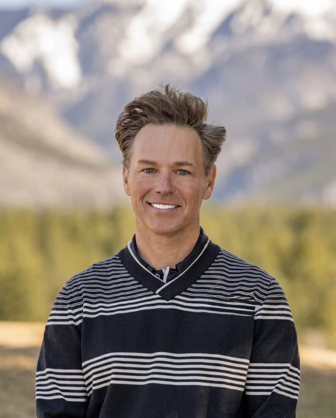 Jimmy Kerby, founder of The 88 Club, on a golf course in the mountains